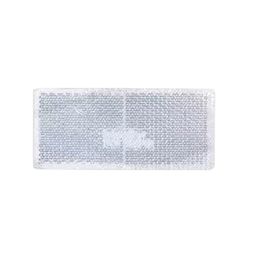 Catadióptrico adhesivo rectangular de 90x40 mm color blanco para señalización.