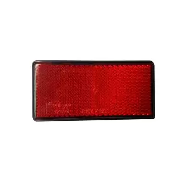 Catadióptrico adhesivo rectangular contorno negro de 105x48 mm color rojo para señalización.